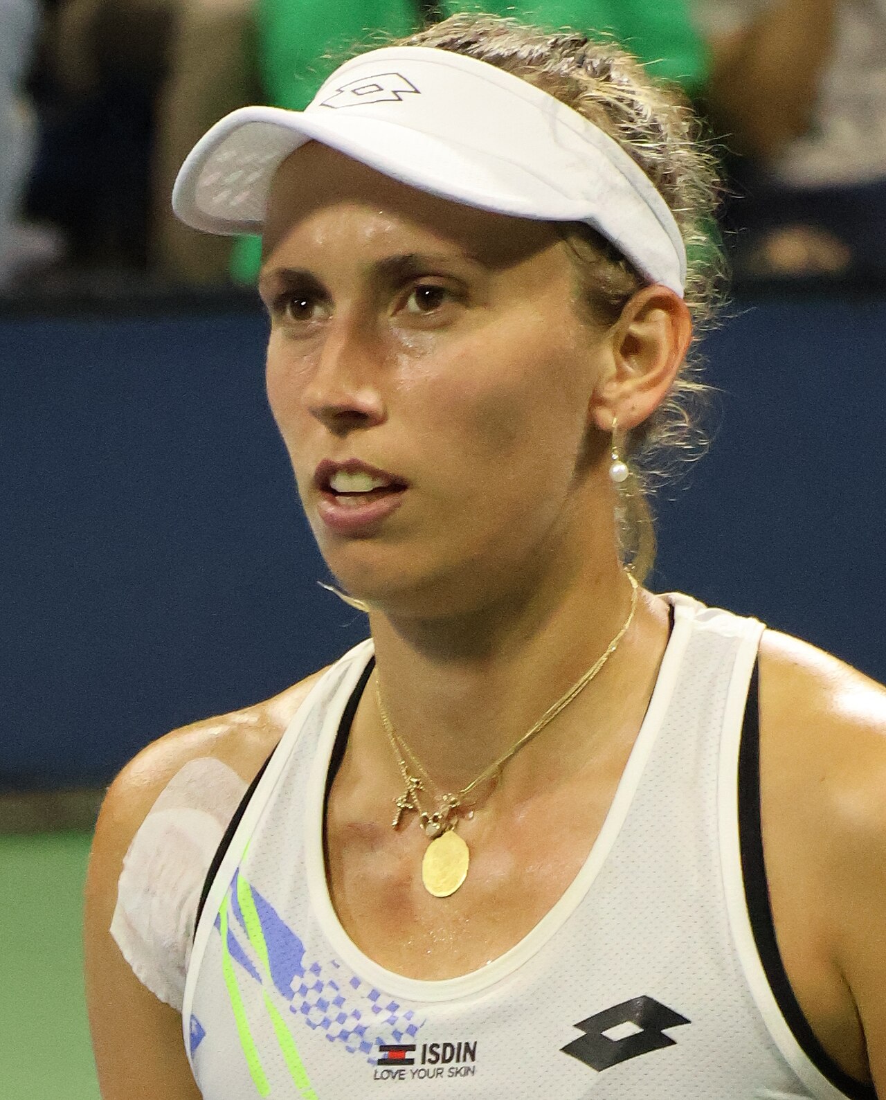 Imagem de referência relacionada a Elise Mertens, item descrito como tenista belga