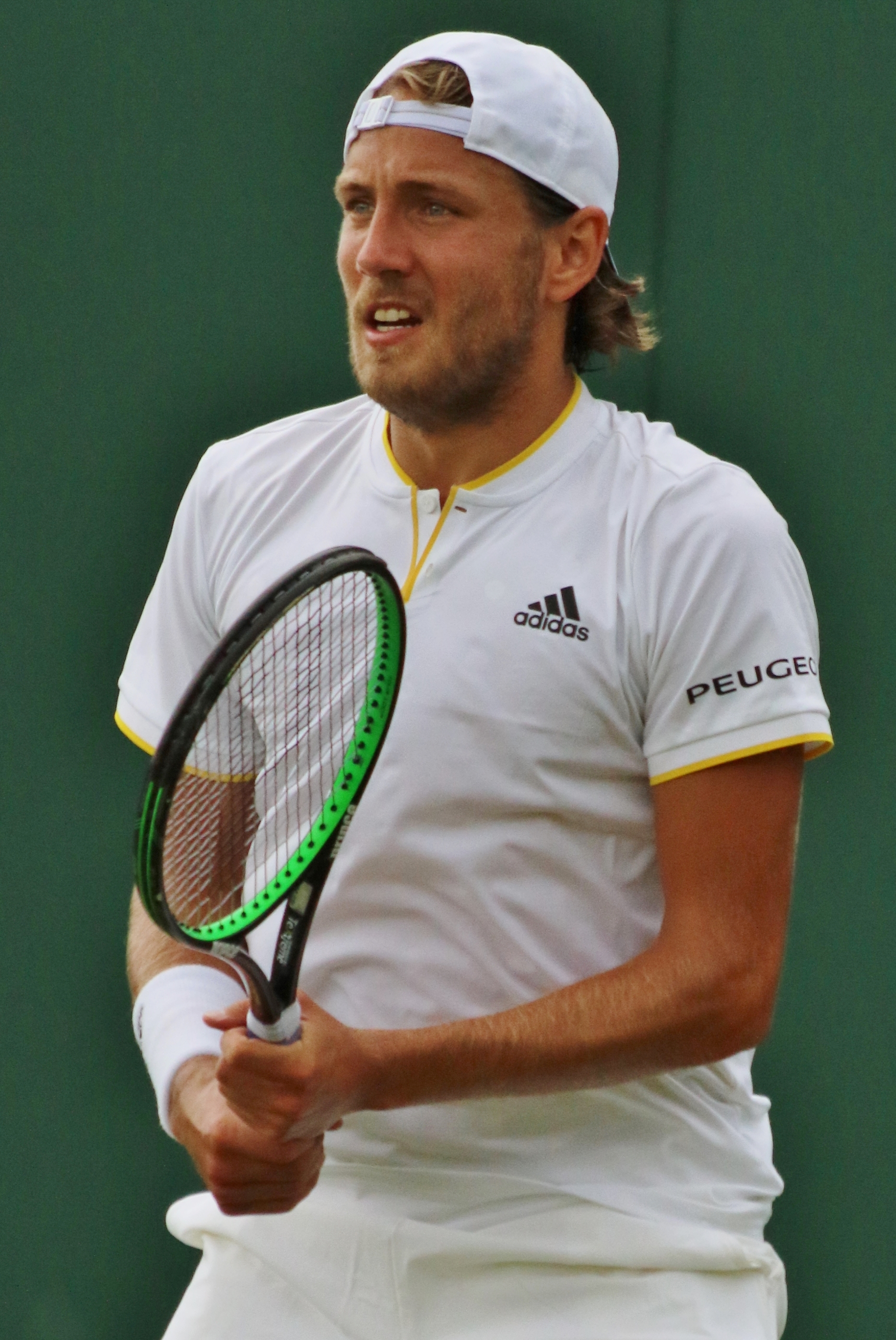 Imagem de referência relacionada a Lucas Pouille, item descrito como tenista francês