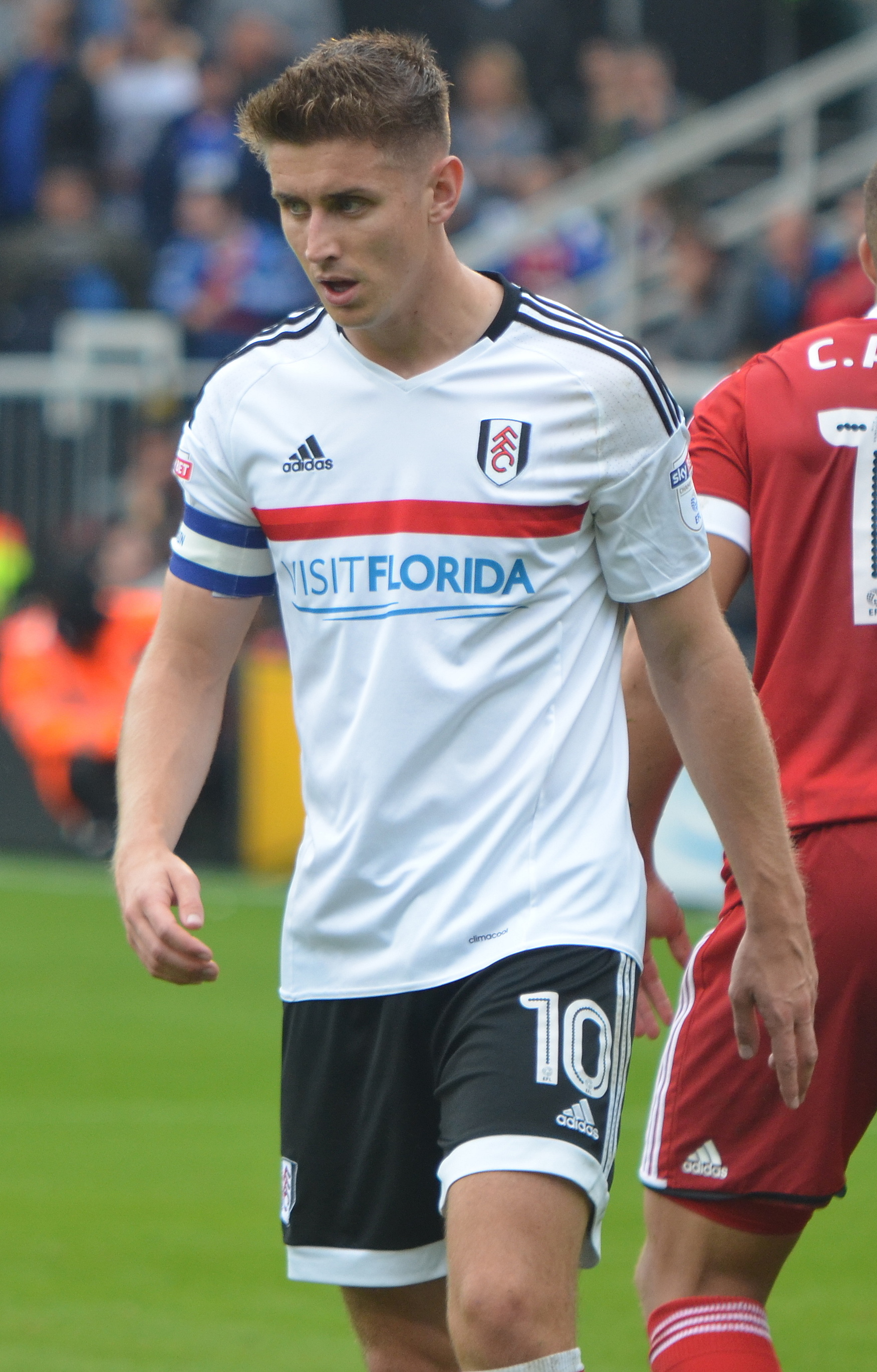 Imagem de referência de Tom Cairney, descrito nos dados abertos como futebolista britânico
