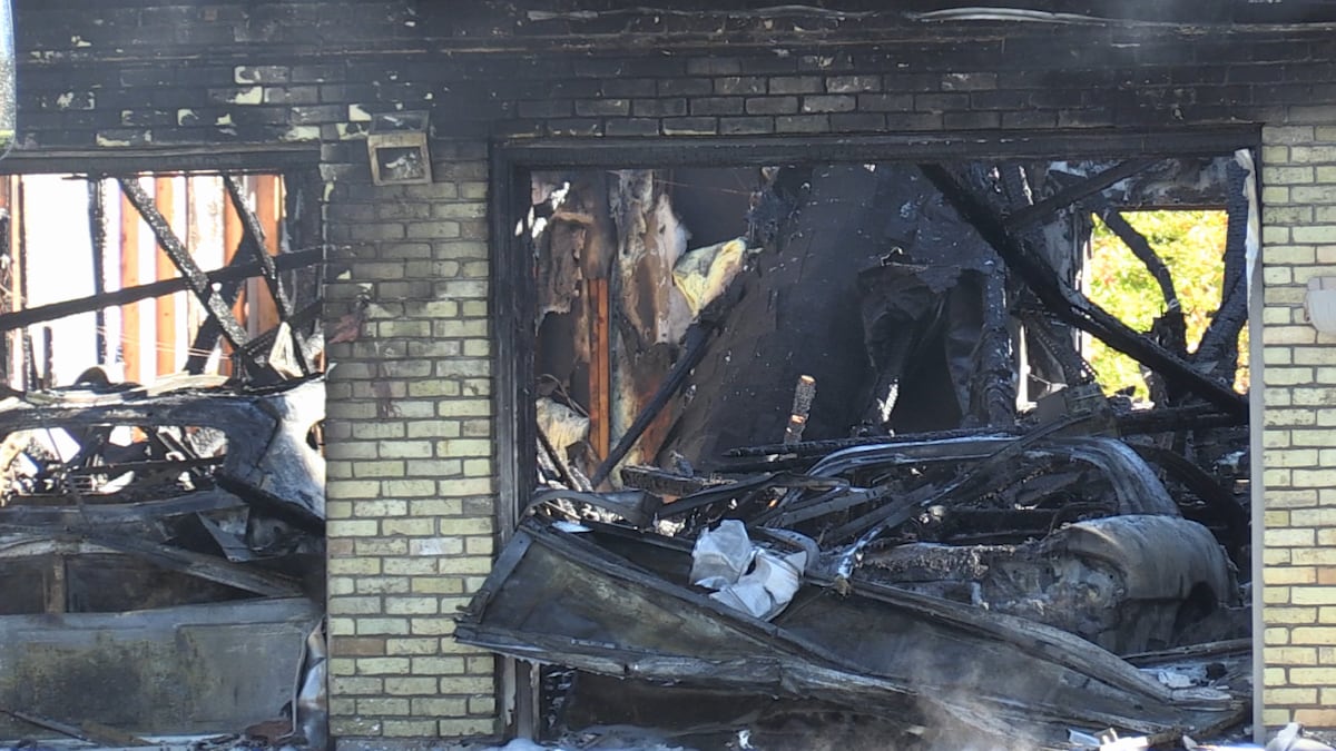 Two taken to hospital after garage fire damages London home